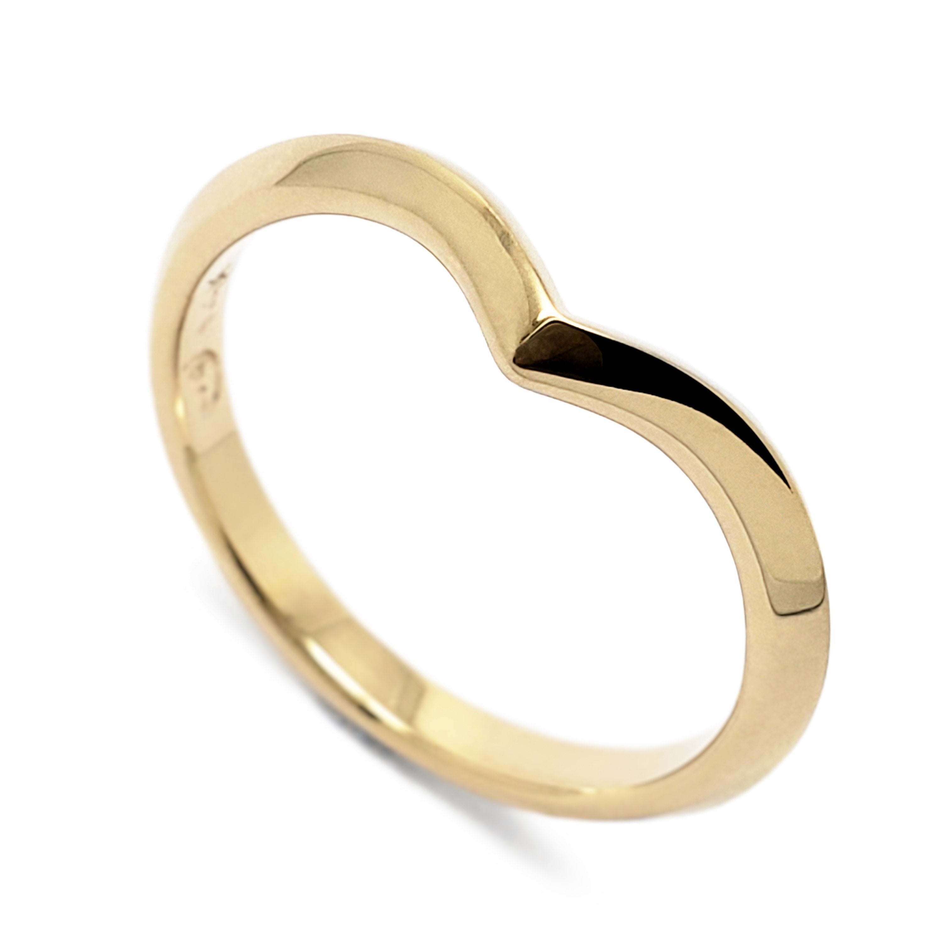 Shaped gold wedding on sale rings