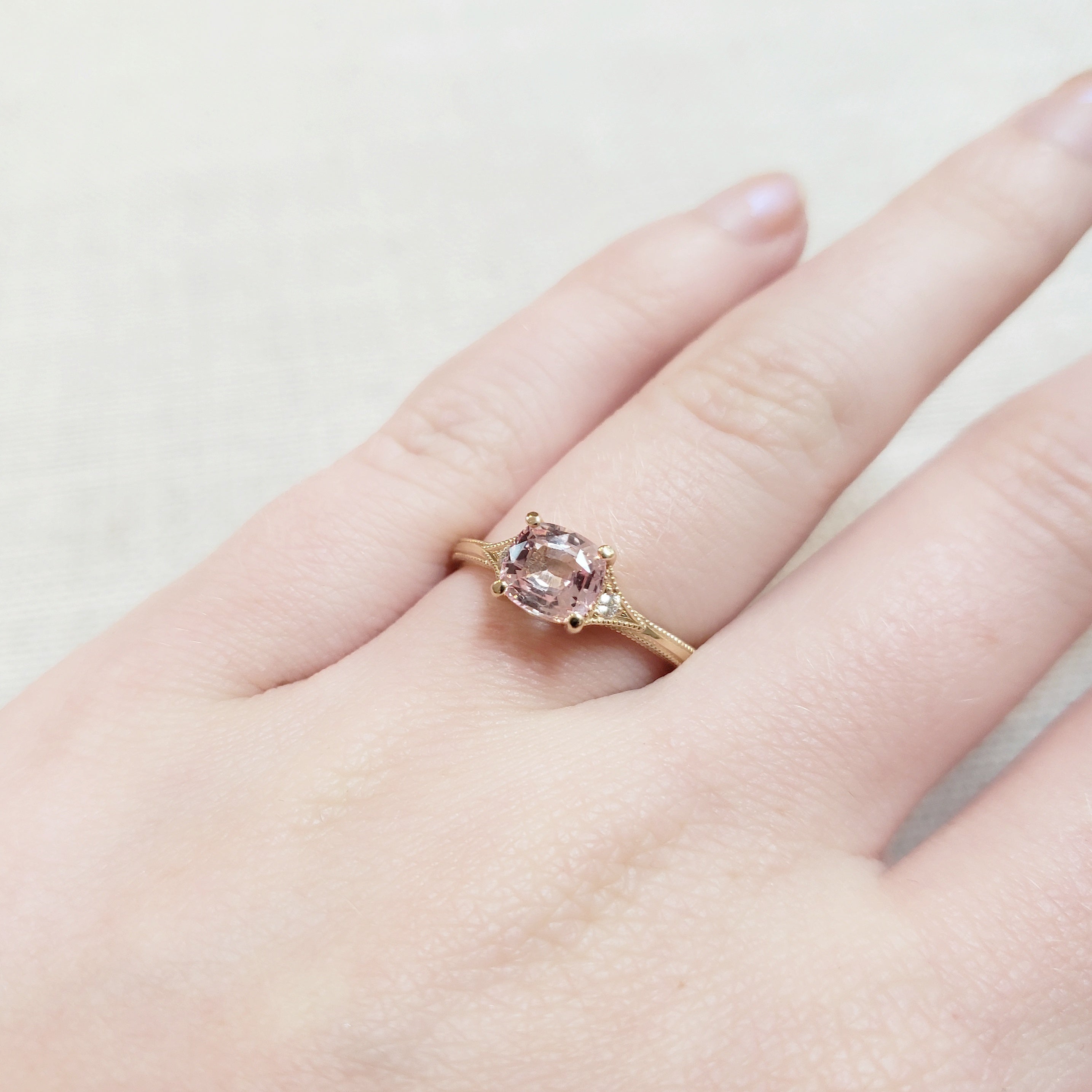 Peach sapphire sale and diamond ring